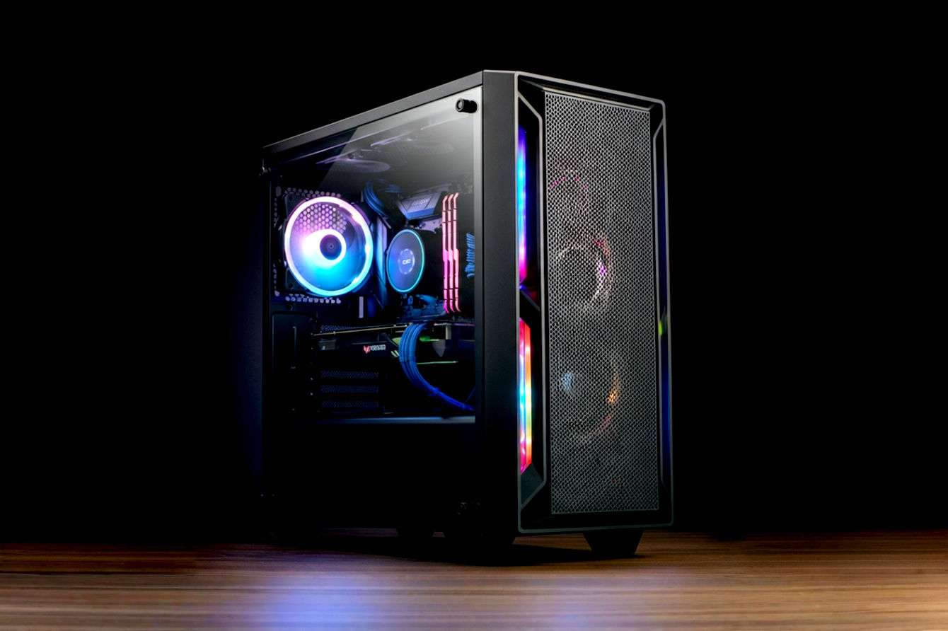 A well-lit, professional photograph of a modern gaming PC tower with subtle RGB lighting visible through a tempered glass side panel. The image should convey performance and value.